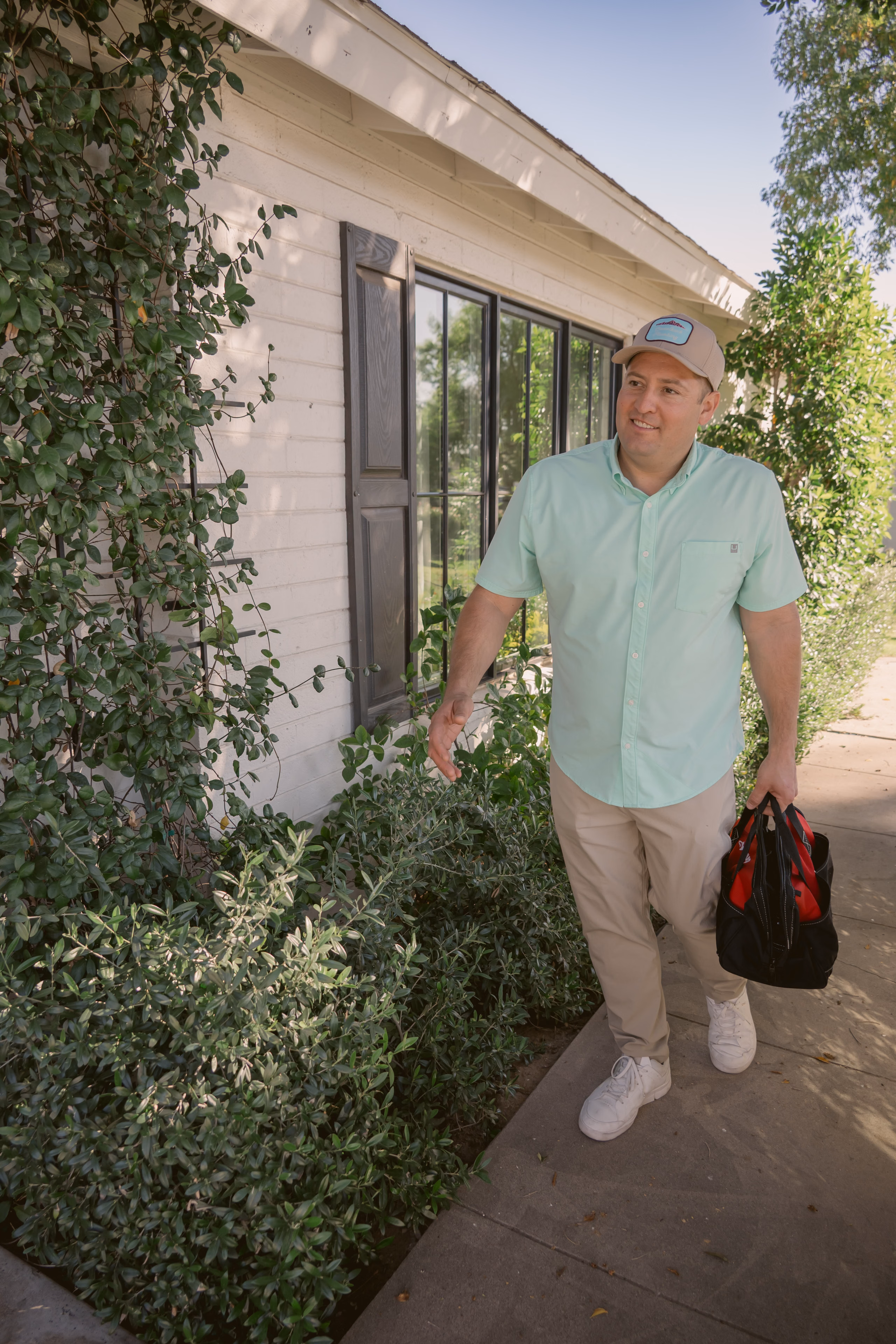 Gabe Sandersius arriving at a home for a plumbing visit